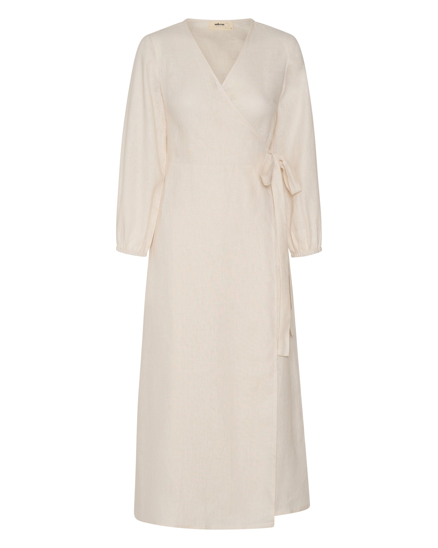 The front of a linen, off white wrap dress.